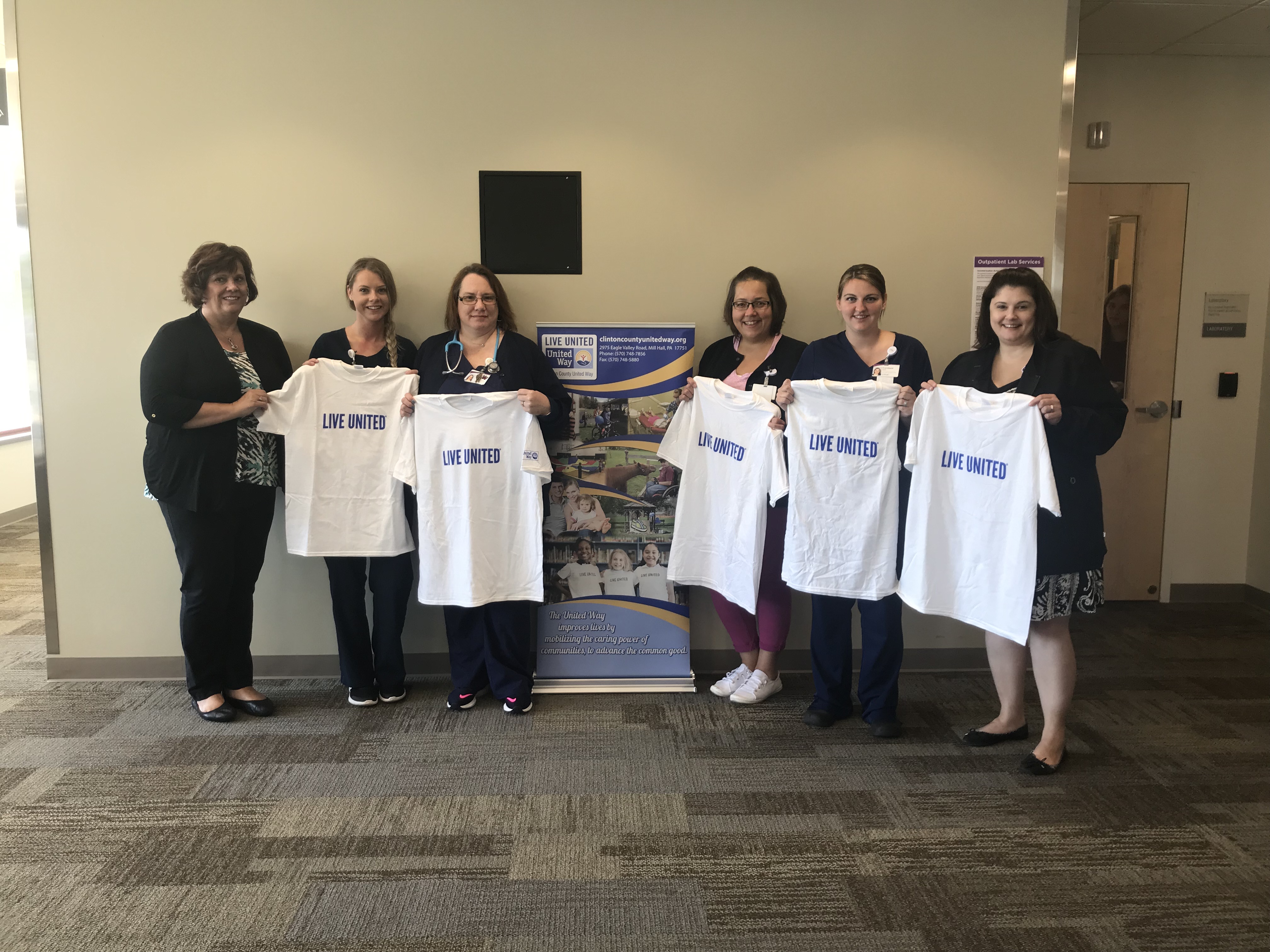 UPMC Outpatient Center | UPMC Susquehanna in McElhattan will be the home of the Clinton County United Way revolving sign for the next 2 weeks.  UPMC Susquehanna is a huge supporter of the Clinton County United Way.  Pictured from left to right: Peg Shaffer (United Way Board Member) Rachel Barner (MA) Sonya Smeal (LPN) Michelle Goodman (OA) Candace Redis (LPN) Lyndsey Schnars (OA)